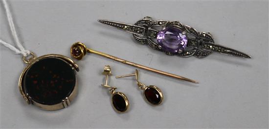 A 9ct gold and garnet stick pin, a pair garnet earrings, a yellow metal fob and a silver and marcasite brooch.